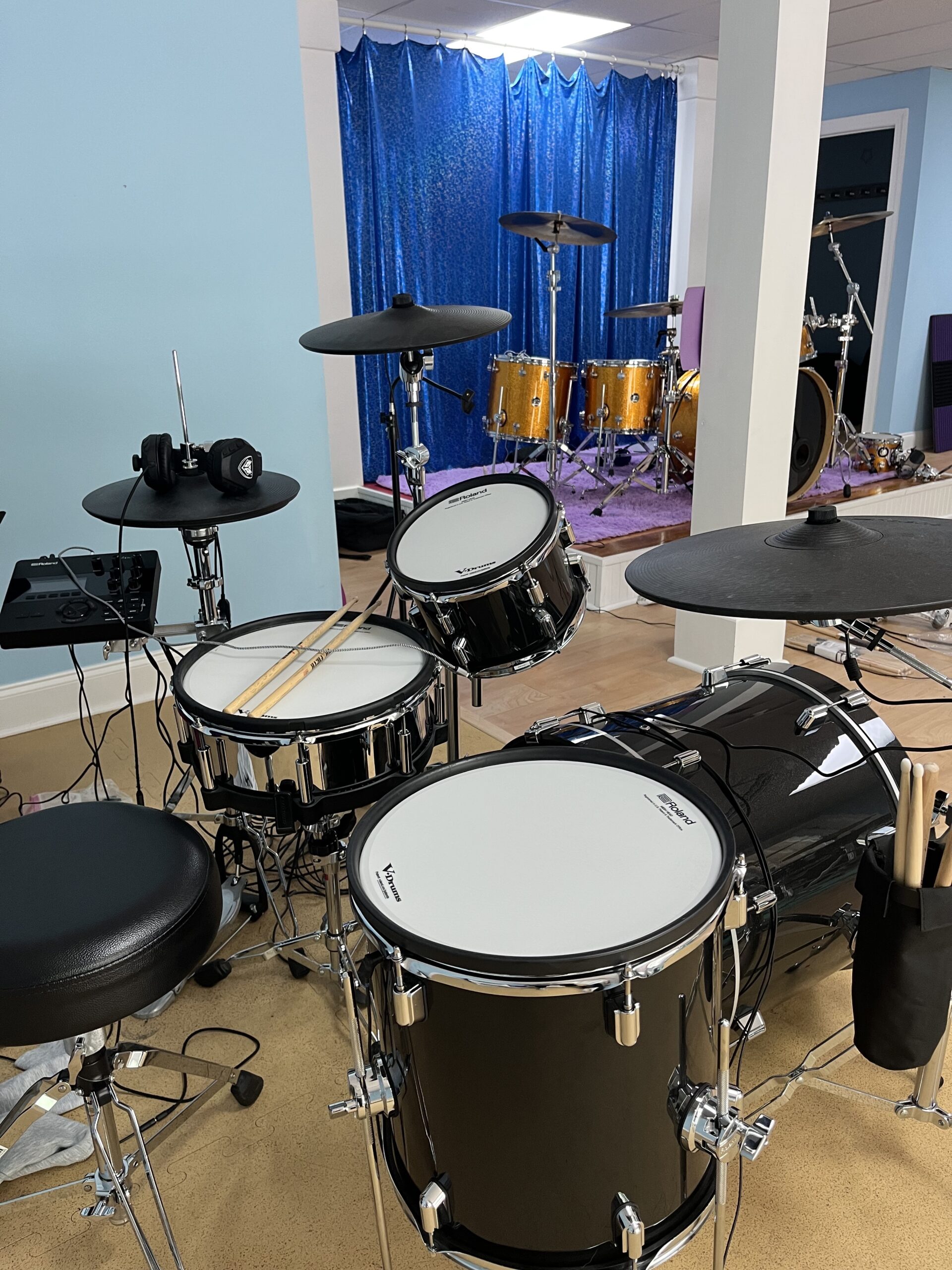 Student electronic kit with Brittany's gold sparkle kit in the background