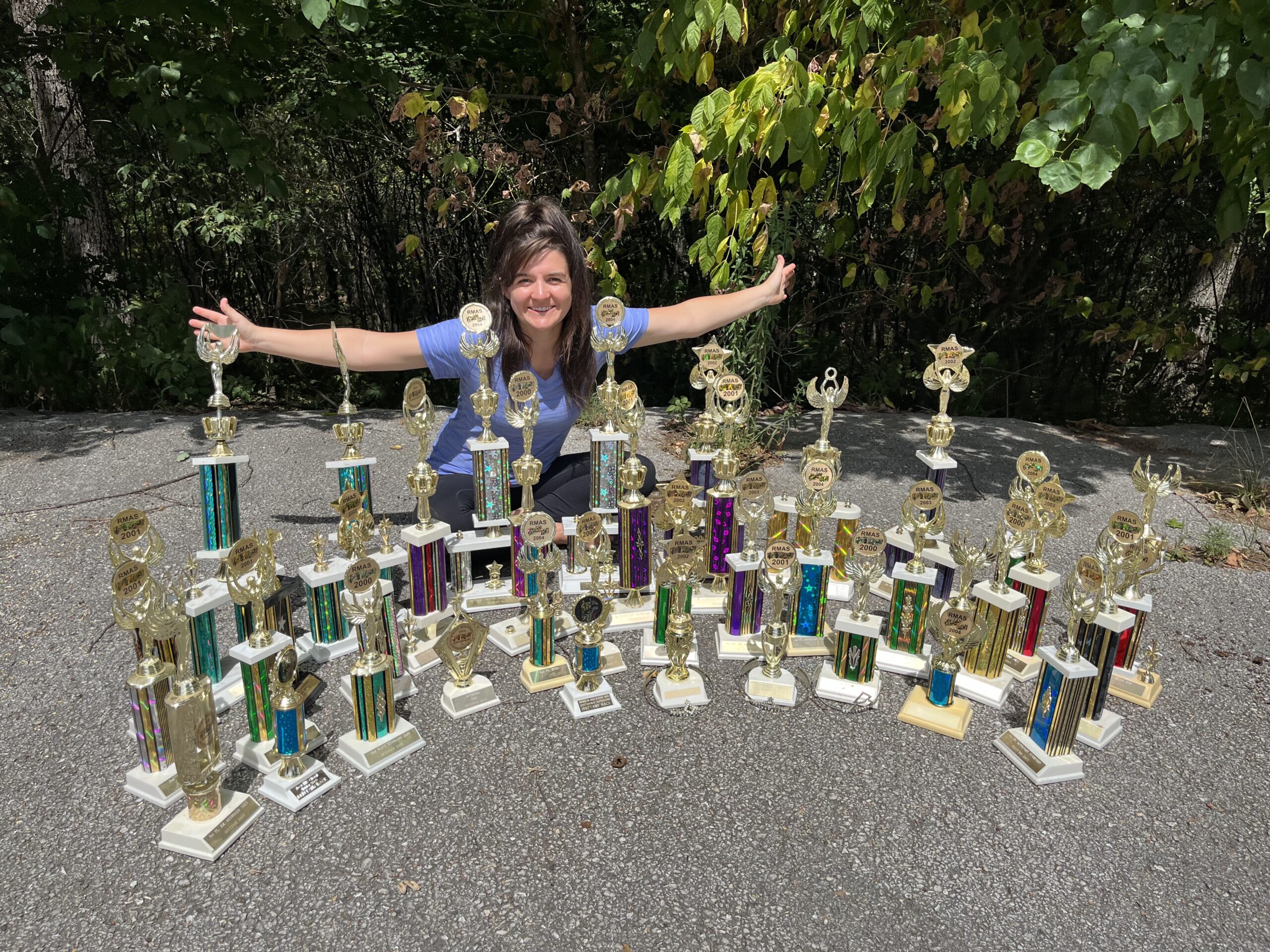 Brittany with a large collection of piano trophies